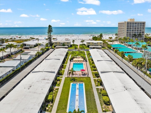 aerial view featuring a water view and a beach view