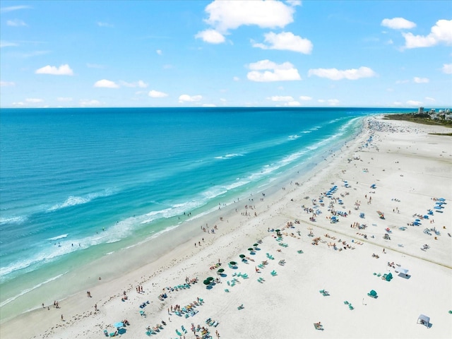 property view of water featuring a beach view