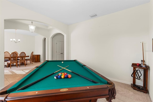 rec room with carpet floors, pool table, and an inviting chandelier