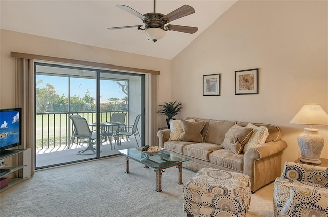 carpeted living room featuring high vaulted ceiling and ceiling fan