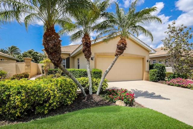 view of front of property with a garage