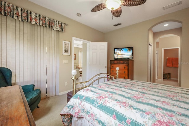 bedroom with light carpet and ceiling fan