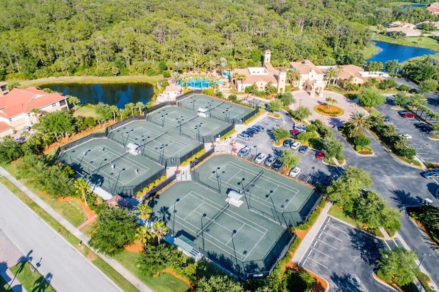 birds eye view of property with a water view