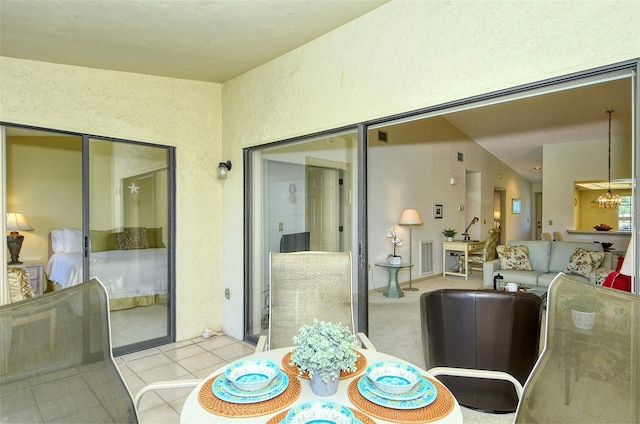 4416 Weybridge Unit 90, Sarasota, FL 34235 - dining area with light tile patterned floors