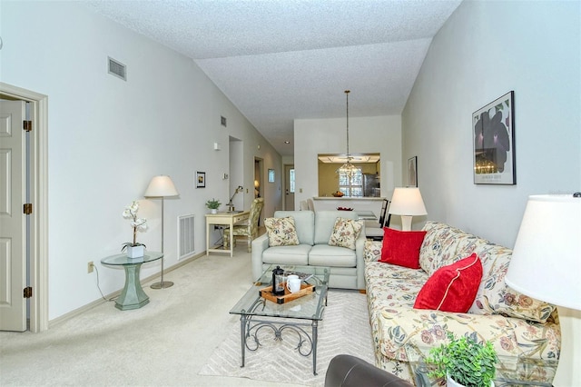 4416 Weybridge Unit 90, Sarasota, FL 34235 - carpeted living area featuring lofted ceiling and baseboards