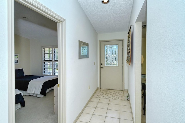 4416 Weybridge Unit 90, Sarasota, FL 34235 - hall with a textured ceiling and baseboards