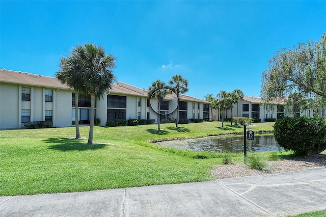 4416 Weybridge Unit 90, Sarasota, FL 34235 - view of community with a yard