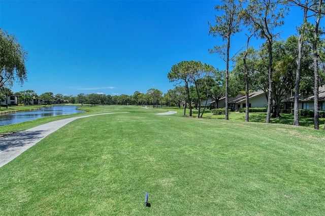 4416 Weybridge Unit 90, Sarasota, FL 34235 - view of green lawn with a water view