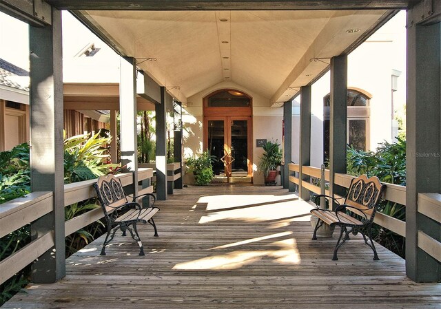 4416 Weybridge Unit 90, Sarasota, FL 34235 - wooden deck with french doors