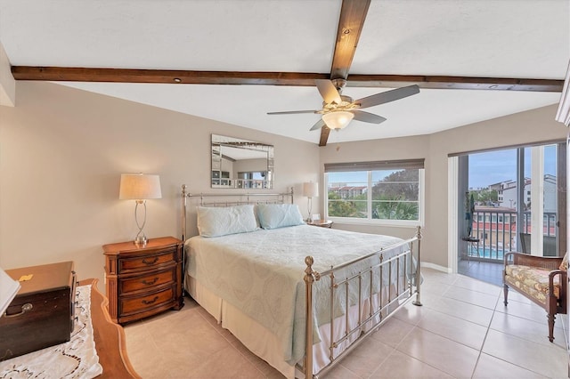 tiled bedroom with vaulted ceiling with beams, access to exterior, and ceiling fan