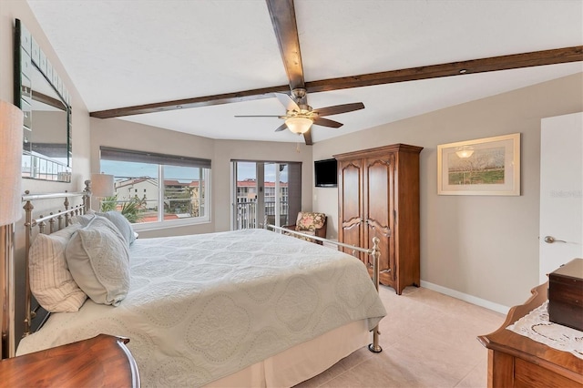 bedroom featuring beamed ceiling and ceiling fan