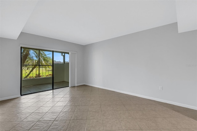 empty room featuring light tile patterned floors