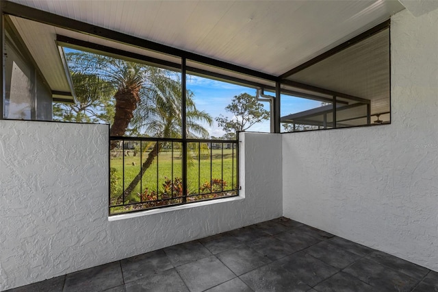 unfurnished sunroom featuring wooden ceiling