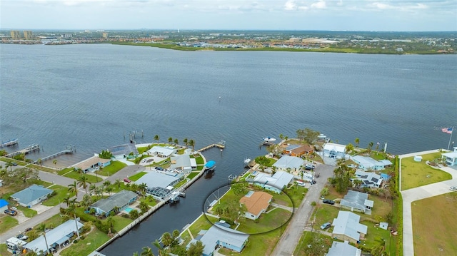 drone / aerial view with a water view