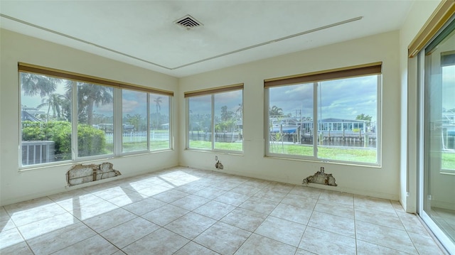 unfurnished sunroom featuring plenty of natural light