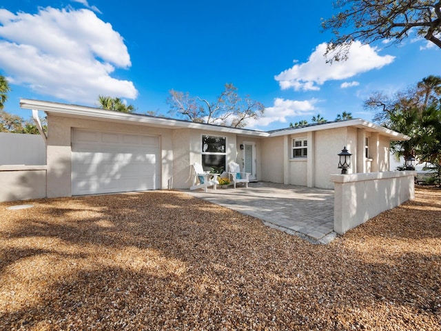 ranch-style house with a garage