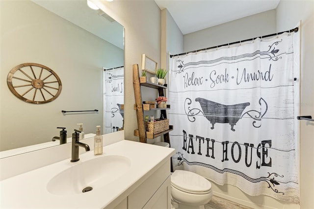 full bathroom featuring toilet, vanity, hardwood / wood-style flooring, and shower / bathtub combination with curtain