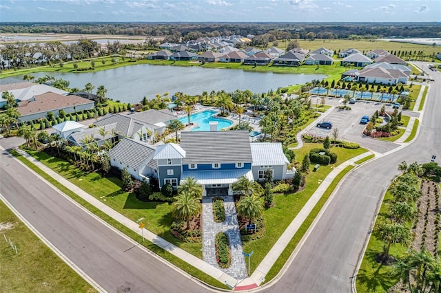 drone / aerial view with a water view