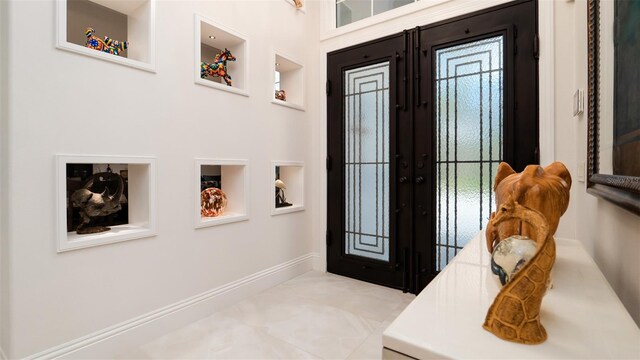 9260 Swaying Branch Rd, Sarasota, FL 34241 - foyer with french doors and baseboards