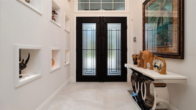 9260 Swaying Branch Rd, Sarasota, FL 34241 - entryway with french doors and baseboards