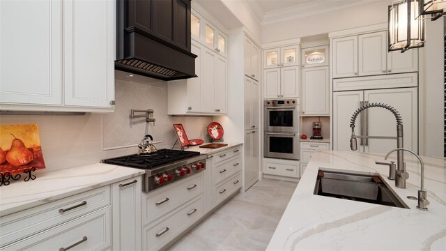 9260 Swaying Branch Rd, Sarasota, FL 34241 - kitchen with a sink, stainless steel appliances, crown molding, premium range hood, and white cabinets