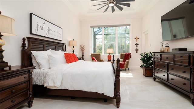 bedroom with ornamental molding and ceiling fan