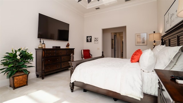 bedroom with ceiling fan and ornamental molding