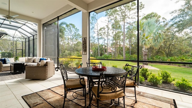 sunroom / solarium with ceiling fan