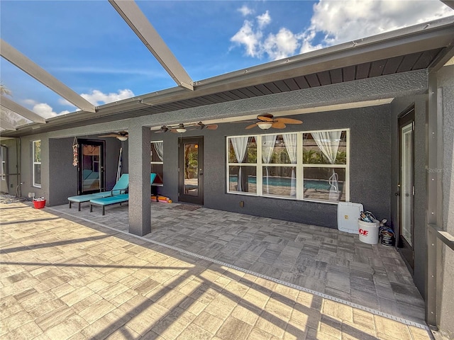 view of patio with ceiling fan