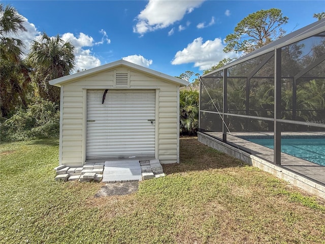 view of outdoor structure with a yard