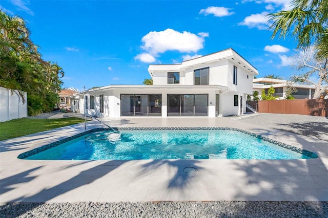 back of property featuring a patio area