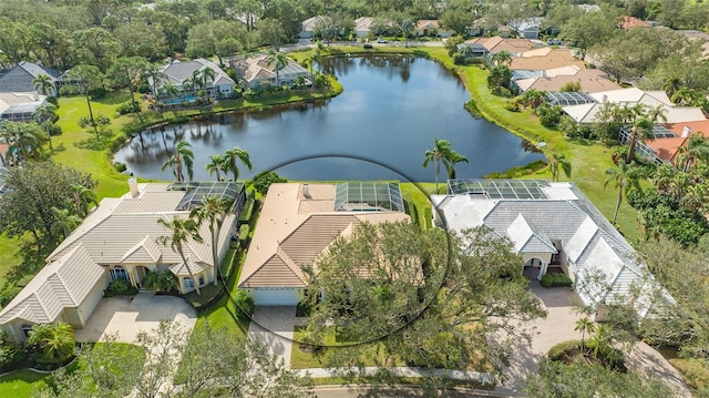 drone / aerial view with a water view