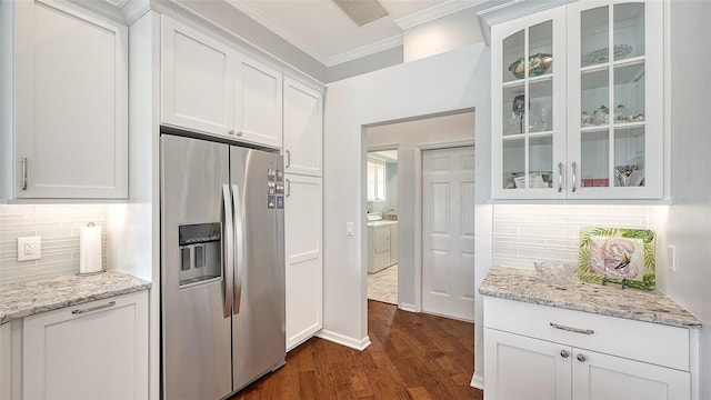 kitchen featuring white cabinets, stainless steel fridge with ice dispenser, dark hardwood / wood-style floors, and crown molding