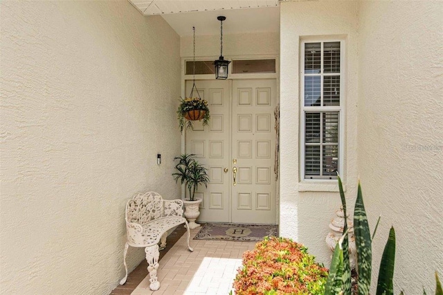 4561 Murcia Blvd Unit 13, Sarasota, FL 34238 - property entrance featuring stucco siding