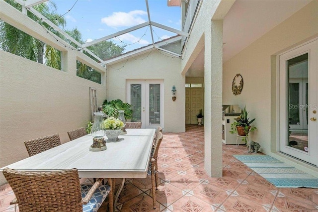 4561 Murcia Blvd Unit 13, Sarasota, FL 34238 - sunroom / solarium with french doors, a skylight, and healthy amount of natural light
