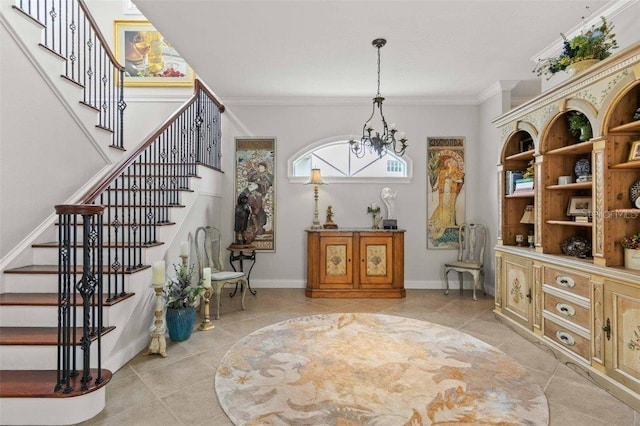 4561 Murcia Blvd Unit 13, Sarasota, FL 34238 - foyer with stairway, a chandelier, light tile patterned floors, crown molding, and baseboards