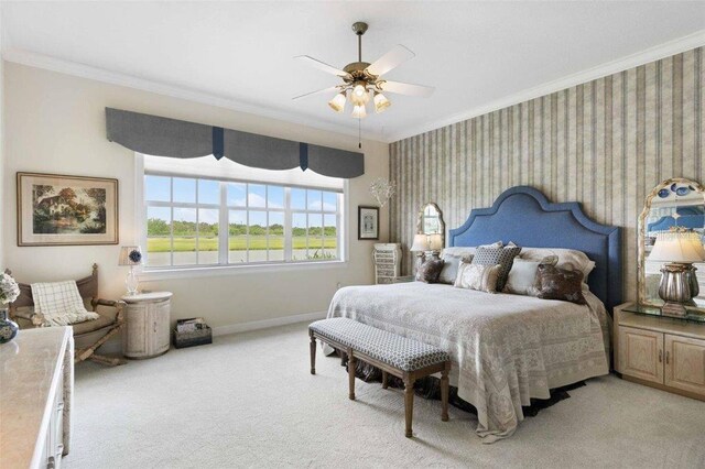 4561 Murcia Blvd Unit 13, Sarasota, FL 34238 - bedroom featuring ornamental molding, light carpet, baseboards, wallpapered walls, and ceiling fan