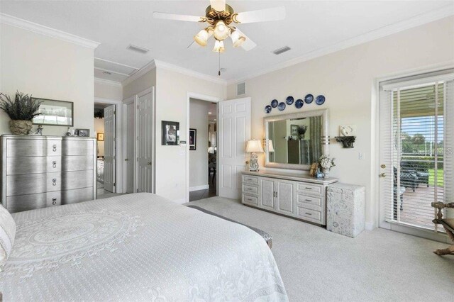 4561 Murcia Blvd Unit 13, Sarasota, FL 34238 - carpeted bedroom with access to outside, crown molding, baseboards, and a ceiling fan