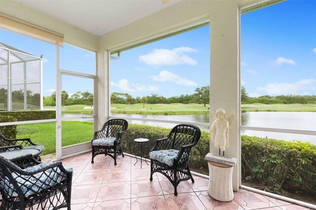 4561 Murcia Blvd Unit 13, Sarasota, FL 34238 - sunroom with a water view