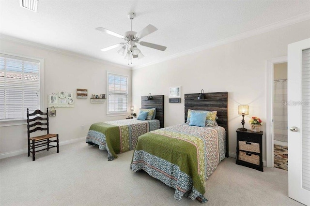 4561 Murcia Blvd Unit 13, Sarasota, FL 34238 - carpeted bedroom featuring ornamental molding, baseboards, and ceiling fan