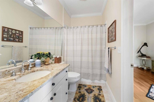 4561 Murcia Blvd Unit 13, Sarasota, FL 34238 - bathroom with toilet, vanity, crown molding, a shower with shower curtain, and baseboards
