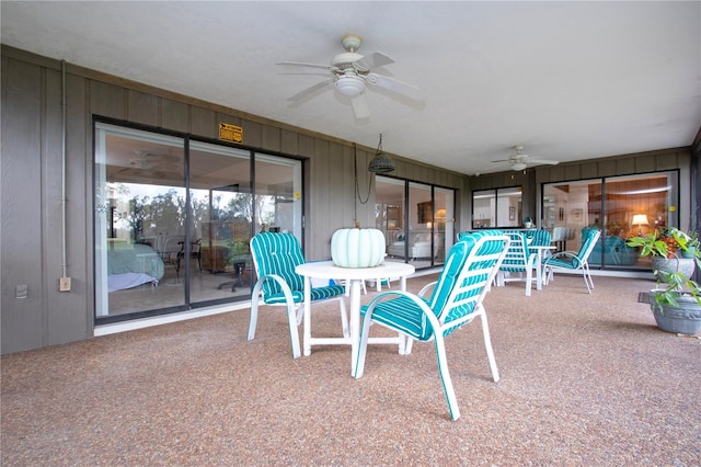 view of patio featuring ceiling fan