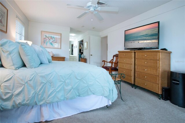 bedroom with light colored carpet and ceiling fan