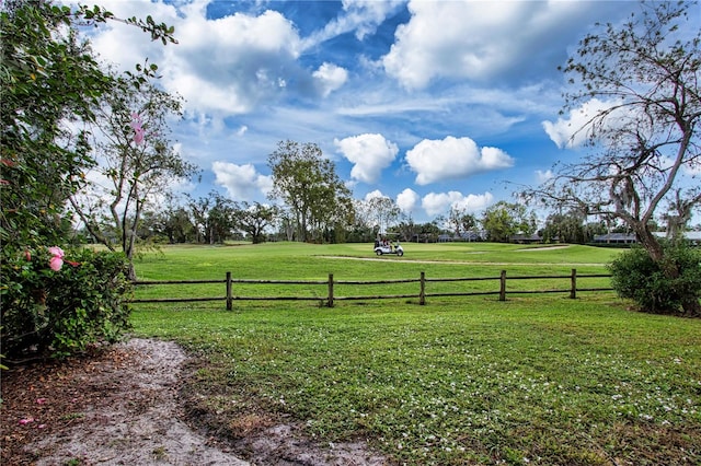 view of yard with a rural view