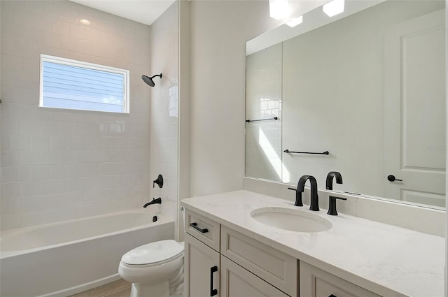 full bathroom with vanity,  shower combination, and toilet