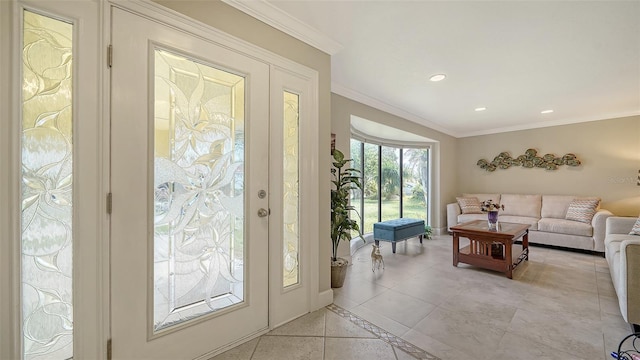 doorway to outside with light tile patterned floors and crown molding