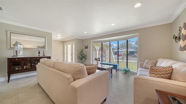 tiled living room with ornamental molding and a textured ceiling