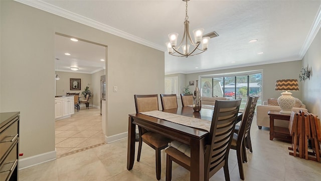 dining area featuring an inviting chandelier, light tile patterned floors, and crown molding