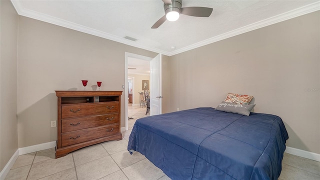 tiled bedroom featuring ceiling fan and crown molding