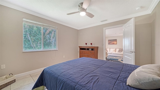 bedroom featuring light tile patterned flooring, ceiling fan, and crown molding